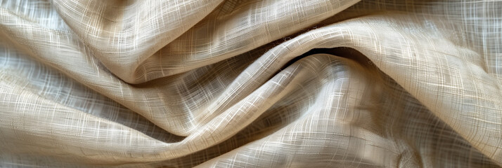 Closeup of beige linen fabric, capturing Its natural texture and subtle sheen in soft, warm tones