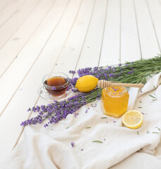 Honey and lavender bouquets. Virus treatment concept. Wooden table. - 783412632