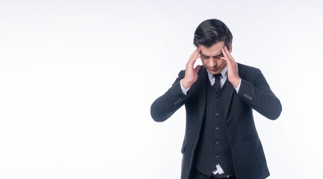 Disappointment unhappy businessman holding hands on head worry problem over isolated white background. Serious tired handsome man suit distressed holding hands on facd sadness. Upset loss guy despair.