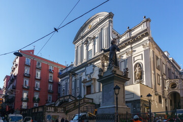 Townscape of facade of Basilica of San Paolo Maggiore with Monumento a San Gaetano in Naples, Campania, Italy
