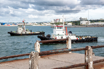 Two tugboats waiting to provide service in the port of Mar del Plata
