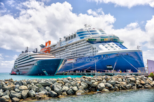 Tortola, British Virgin Islands - March 27, 2024: The Ritz Carlton Evrima and Celebrity Ascent cruise ships docked at the pier in Tortola in the British Virgin Islands
