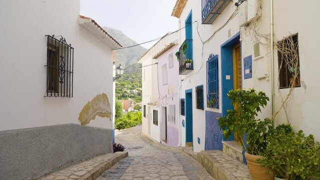 A morning walk through the colorful narrow streets of Finestrat, Spain, offers a charming and picturesque experience of Mediterranean beauty.
