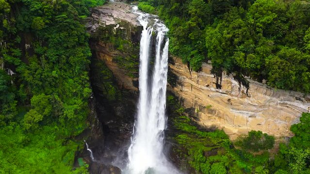 Waterfall in the jungle. Laxapana Falls in the rainforest. Sri Lanka.