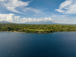 View from the sea to the island of Negros with mountains. Negros, Philippines
