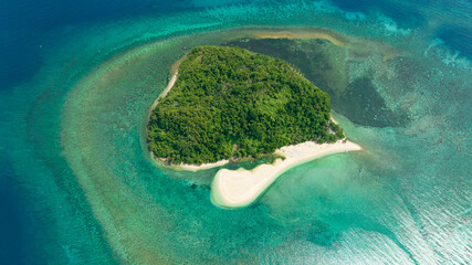 Aerial view of island in the blue sea with atoll and the beach. Agutaya island, Philippines.