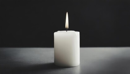 Fototapeta na wymiar burning candle on black background