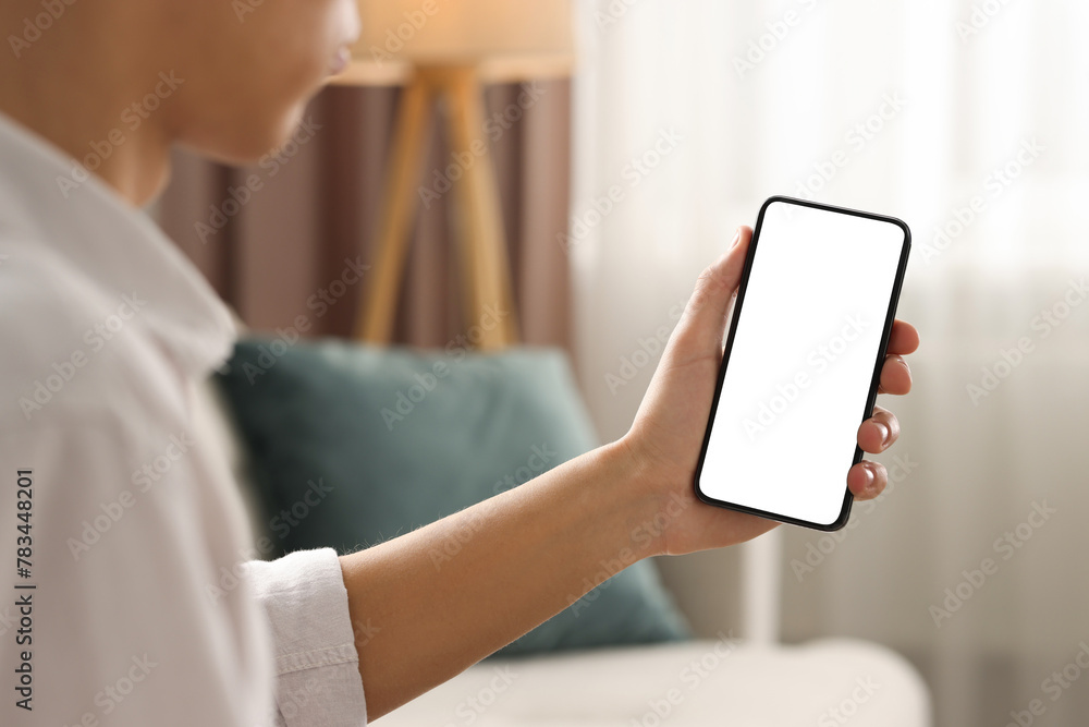 Poster man using smartphone with blank screen indoors, closeup. mockup for design