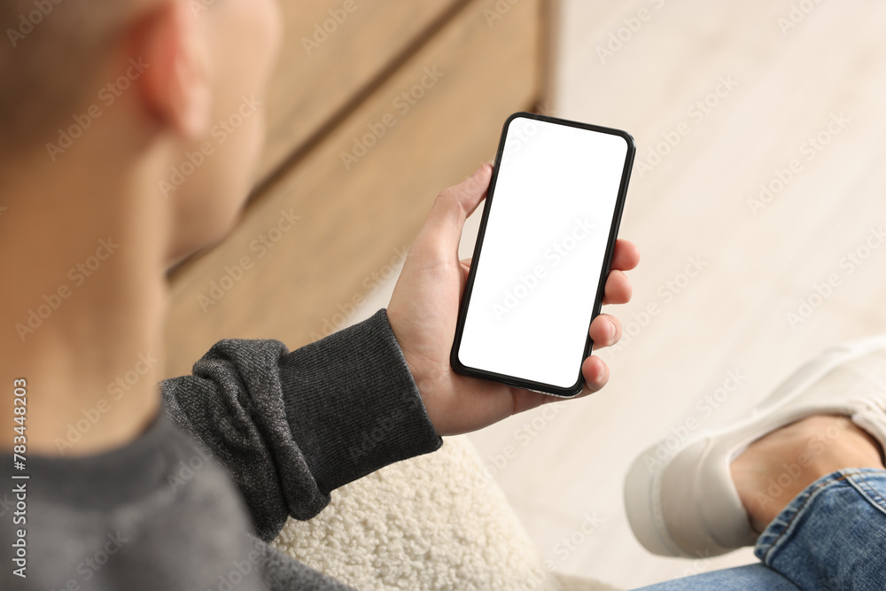 Poster man using smartphone with blank screen indoors, closeup. mockup for design