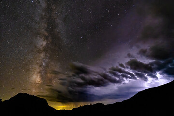 Volcano, Milky Way, and a Thunderstorm © Logan