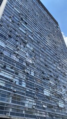 A skyscraper with many mirrored floors in São Paulo is the Italia Building. This iconic skyscraper, located in the city center, is known for its impressive glass façade that reflects the skyline of th