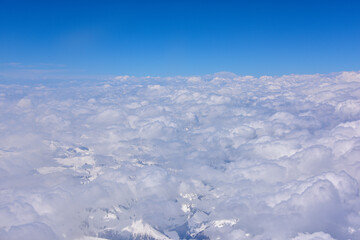 Fototapeta na wymiar Aerial view of snow capped mountains in Sichuan and Tibet, China