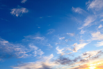Pastel light cirrus clouds in the blue sky during dawn sunset sunrise, sky background 2