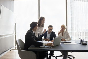 Team sit at desk with laptop, analyzing market trends, review financial statements, planning budget, share marketing strategy working on revenue increasing, discuss ideas for new products or services