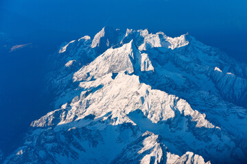 Aerial view of snow capped mountains in Sichuan and Tibet, China - obrazy, fototapety, plakaty