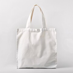 Blank tote bag mockup on a clean white background, canvas texture highlighted, perfect for customizable design presentations