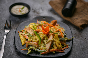 Hawaiian Chicken salad with chopped crispy cabbage, carrot, capsicum, pineapple and sweet dressing