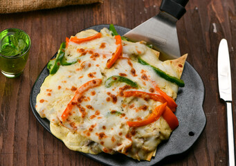 Countless layers of lasagna noodles, grilled chicken, variety of cheese, and  special creamy white sauce. Baked in the oven and served to your table piping hot
