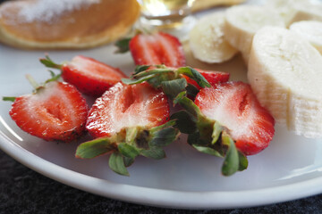  Ripe Red Strawberries in a bowl on table 
