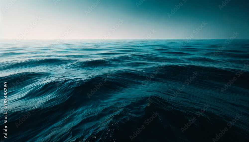 Poster a dark and serene ocean landscape showing gentle waves, with a creative concept on a gradient blue b