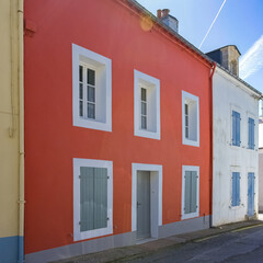 Fototapeta na wymiar Sauzon in Belle-Ile, Brittany, typical street in the village, with colorful houses 