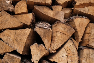Dry firewood logs detail texture background, Pile of splitting firewood