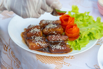 Closeup to Braised Pork Belly in dish  