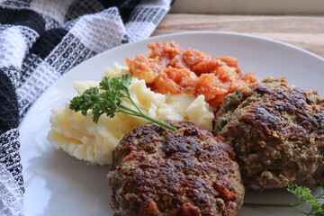meatballs with mashed potatoes. South African frikkadels with mash and tomato smoor