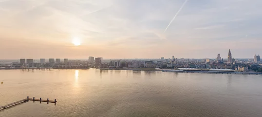 Schilderijen op glas Antwerp, Belgium. Panorama of the city. Summer morning. Aerial view © nikitamaykov