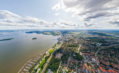 Vasteras, Sweden. Panorama of the city in summer in cloudy weather. Aerial view - obrazy, fototapety, plakaty