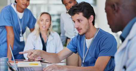Medical, nurse and laptop or meeting in conference room and technology, healthcare or discussion. Collaboration, doctor or team in boardroom for surgery brainstorming and, pointing or health planning