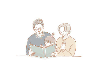 幼い女の子に本を読む初老の男性と女性、（祖父母と孫）