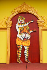 Body painted artist cutout perform at Swaraj round in Thrissur Kerala India. Tiger dance is a traditional folk art performed during Onam.