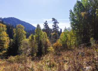 the beginning of autumn in nature , nature walks, panoramic views , hiking trails and recreation in the mountains.