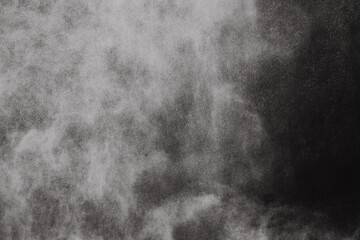 Water dust flying from a waterfall. - obrazy, fototapety, plakaty