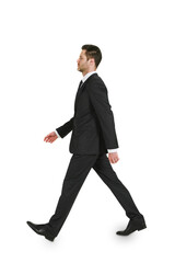 A man in a business suit walking isolated on a white background, ideal for clean design elements