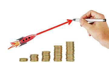 Hand drawing a rising arrow representing growth, with a rocket and coin stacks against white background, depicting financial success concept - obrazy, fototapety, plakaty