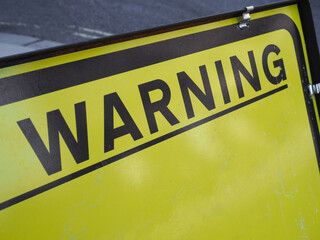 yellow warning sign