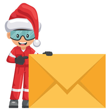 Industrial mechanic with Santa Claus hat with letter envelope for email. Concept of communication, notification and contact. Merry christmas. Industrial safety and occupational health at work