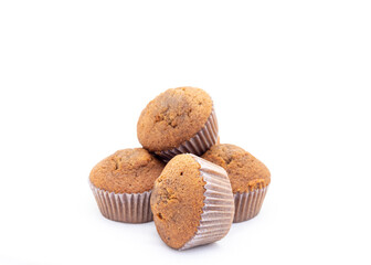Muffins in a paper cups isolated on white background with copy space