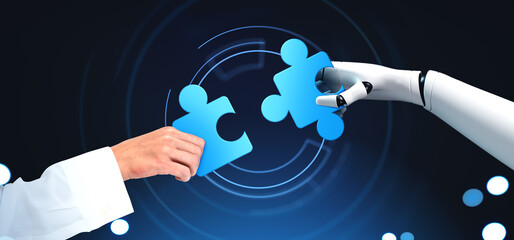 A human hand and a robotic arm holding matching puzzle pieces on a background, symbolizing...