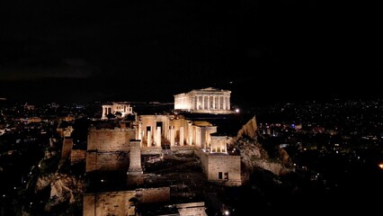 Acropolis in Greece by night , Parthenon in Athens drone aerial view, famous Greek tourist...