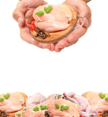 Hand holding meat of chicken isolated