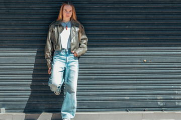 full body fashionable urban blonde girl on the street