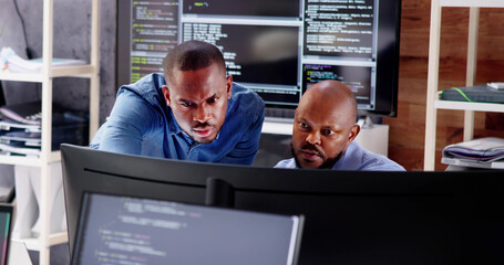 African Business Team Working On Computer