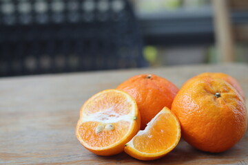 Mandarin orange fruit on wooden table