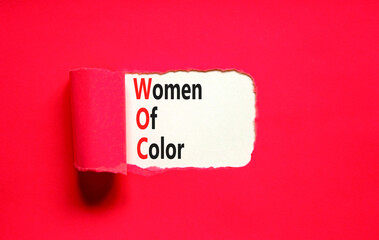 WOC women of color symbol. Concept words WOC women of color on beautiful white paper. Beautiful red paper background. Business WOC women of color social issues concept. Copy space. - obrazy, fototapety, plakaty