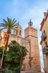 Foto auf Leinwand Blick auf die Rückseite der Kirche des heiligen Bartholomäus und der heiligen Thekla in Sitges, Spanien © Robert Poorten