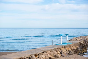 Foto auf Leinwand Duschen am Strand von Sitges, Spanien © Robert Poorten