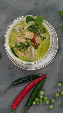  green curry with chicken is placed on the table